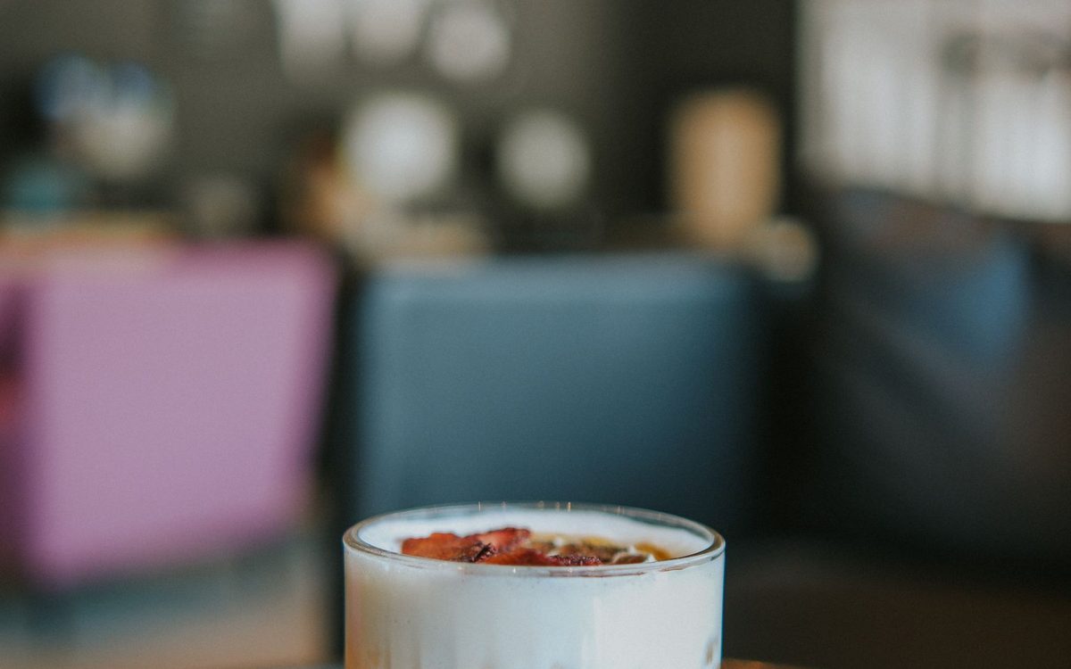 Whiskey sour style cocktail on a bar counter